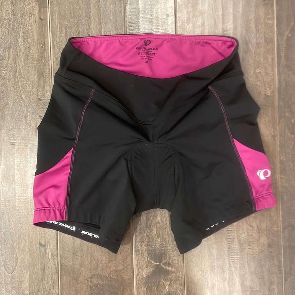 Pearl Izumi magenta and black bike shorts, size Medium